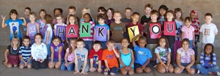 Kids with Thank you sign Kids with Thank you sign